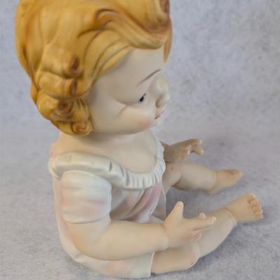Sale Photo Thumbnail #401: Vintage Bisque Piano Babies figurines 
hand painted 
8.5 x 5 x 6.5
no flaws