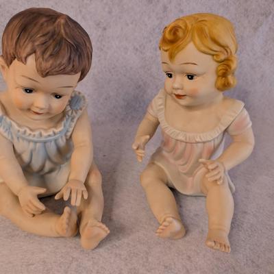 Sale Photo Thumbnail #395: Vintage Bisque Piano Babies figurines 
hand painted 
8.5 x 5 x 6.5
no flaws