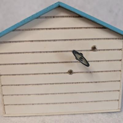 Sale Photo Thumbnail #410: St. Nicholas Square Village Ice Cream Shop Music Box 
As Music Play, the man comes out of the door and goes back in w/ door closing 
6x7x5