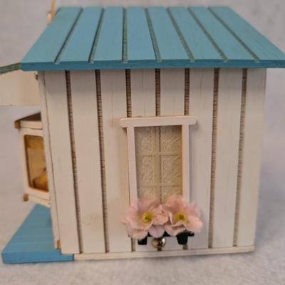 Sale Photo Thumbnail #411: St. Nicholas Square Village Ice Cream Shop Music Box 
As Music Play, the man comes out of the door and goes back in w/ door closing 
6x7x5