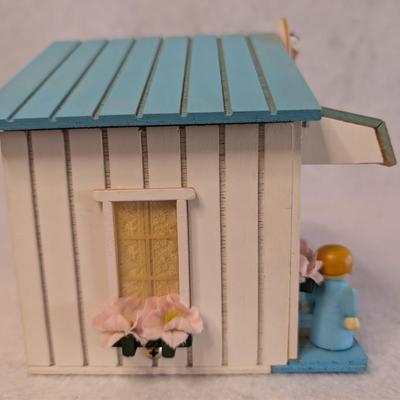 Sale Photo Thumbnail #413: St. Nicholas Square Village Ice Cream Shop Music Box 
As Music Play, the man comes out of the door and goes back in w/ door closing 
6x7x5