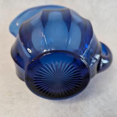 Sale Photo Thumbnail #437: Imperial Glass Ohio Old Williamsburg Deep Cobalt Blue Glass Pitcher 
5x9
32 oz