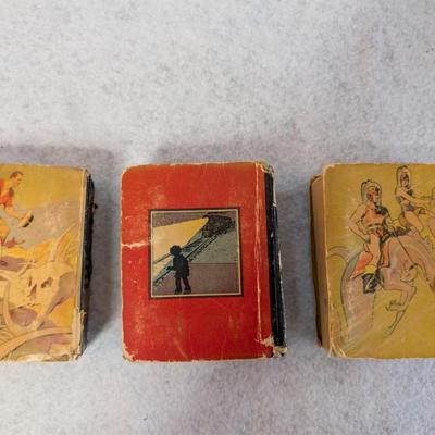 Sale Photo Thumbnail #439: Set of "Wee Little Books" w/ bookends from 1930s-1940s
comed w/ 3 books in good condition w/ two bear bookends 
books measure: 4.2x3