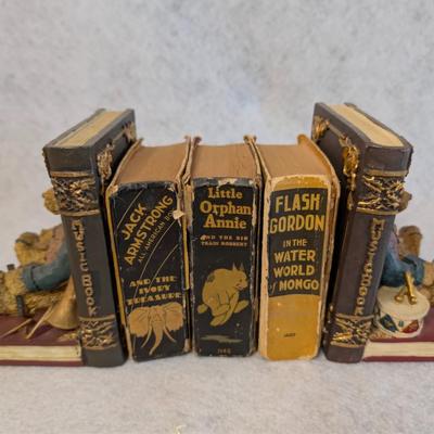 Sale Photo Thumbnail #442: Set of "Wee Little Books" w/ bookends from 1930s-1940s
comed w/ 3 books in good condition w/ two bear bookends 
books measure: 4.2x3