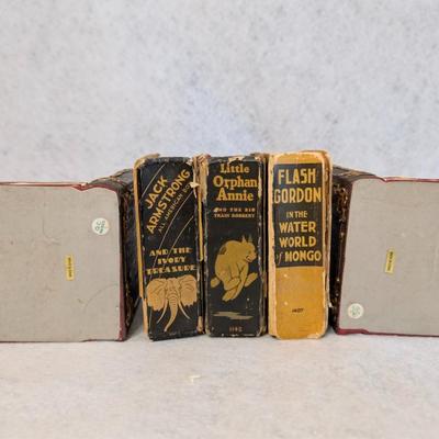 Sale Photo Thumbnail #441: Set of "Wee Little Books" w/ bookends from 1930s-1940s
comed w/ 3 books in good condition w/ two bear bookends 
books measure: 4.2x3