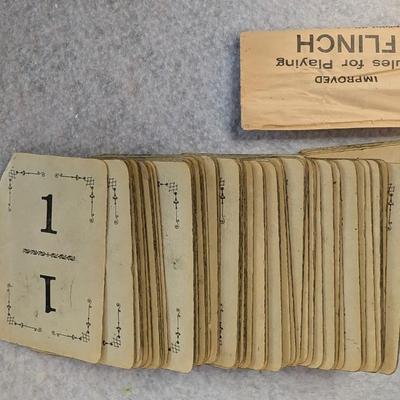 Sale Photo Thumbnail #446: Vintage Flinch Playing cards in box w/ manual 
standard sixed playing cards 
box measures: 4x2