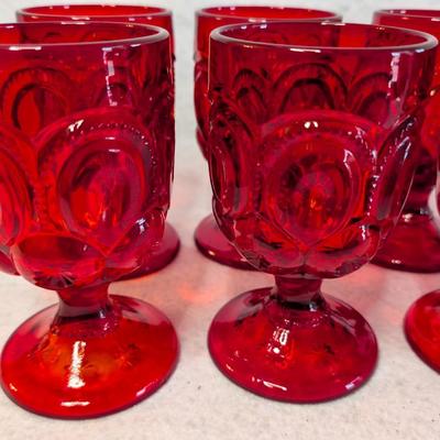 Sale Photo Thumbnail #482: Set of 12 LE Smith Moon and Stars Ruby Red Goblets 
heavy glass
6 Goblets 6 x 3.5
6 Goblets 4.5 x 2.5