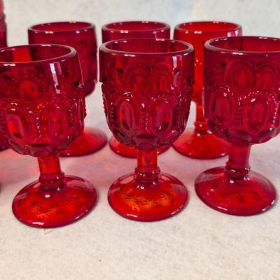 Sale Photo Thumbnail #483: Set of 12 LE Smith Moon and Stars Ruby Red Goblets 
heavy glass
6 Goblets 6 x 3.5
6 Goblets 4.5 x 2.5