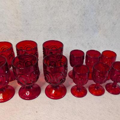 Sale Photo Thumbnail #481: Set of 12 LE Smith Moon and Stars Ruby Red Goblets 
heavy glass
6 Goblets 6 x 3.5
6 Goblets 4.5 x 2.5