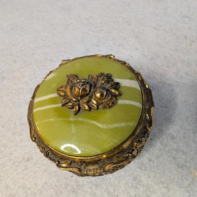 Sale Photo Thumbnail #506: Vintage Gold Toned Metal Jewelry Box/Music Box w Intricate Rose Detailing 
2.5 x 4
tested-works