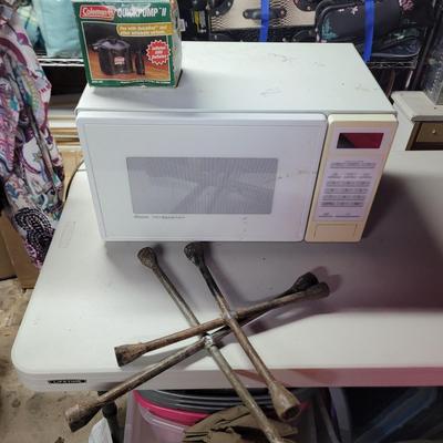 Sale Photo Thumbnail #509: If you get your tire off and the spare is flat, find an outlet and fill up your air mattress for a nap and then heat up a hot pocket for a snack! 4-way tire irons make fine gifts for those hard to shop for folks.