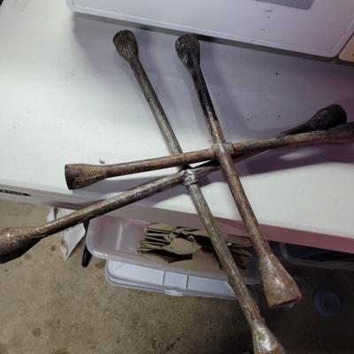 Sale Photo Thumbnail #512: If you get your tire off and the spare is flat, find an outlet and fill up your air mattress for a nap and then heat up a hot pocket for a snack! 4-way tire irons make fine gifts for those hard to shop for folks.