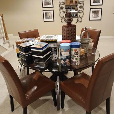 Game table, 4 leather chairs $775 starting price
