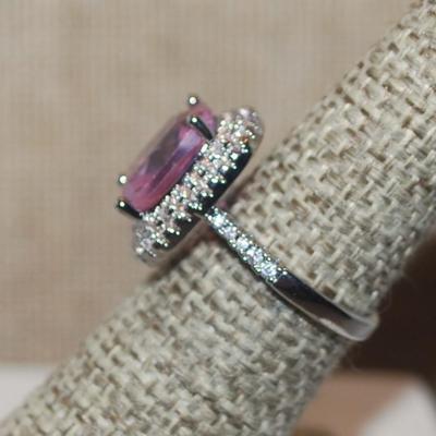 Size 6 PINK Rectangle Main Stone Ring with a Full Nest Surround & 12 Stone Sides on a Silver Tone Band (5.5g)