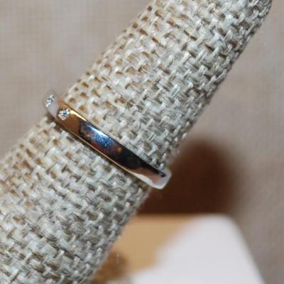 Size 6 Silver Tone Band ½ Infinity Style Ring with 6 Small Clear Stones (1.6g)