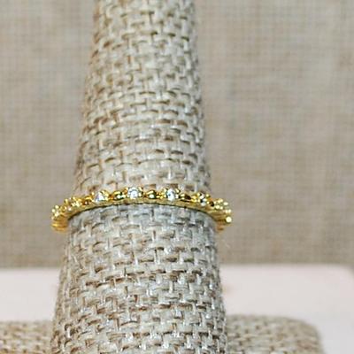 Size 8 Delicate All Infinity Styled Ring with Tiny Round Clear Stones Separated by Half Globe Accents on a Gold Tone Band (1.3g)