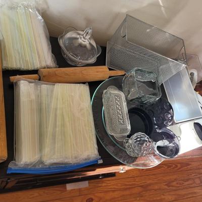 Sale Photo Thumbnail #542: Grater, big straws, red silicone baking and pastry mat with measurement markings, rolling pins, butter dish, serving platter, everything pictured