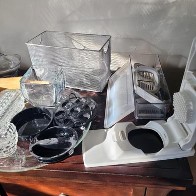 Sale Photo Thumbnail #536: Grater, big straws, red silicone baking and pastry mat with measurement markings, rolling pins, butter dish, serving platter, everything pictured