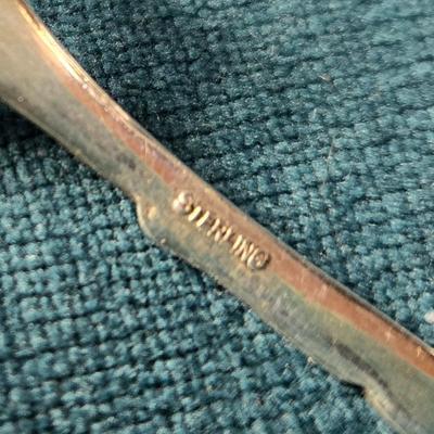 Sale Photo Thumbnail #474: This lot is for a grouping of Antique Serving Pieces.  This is a trio of antique serving pieces. Large fork is marked Wm A .Rogers, Oneida Ltd.  The butter knife is unmarked.  The small fork is marked Sterling and weighs about 8 grams.  All are in very go