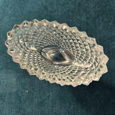 Sale Photo Thumbnail #483: This lot is for a grouping of Diamond Cut Footed Salt Cellars. This is a group of 4 salt cellars.  They are in very good shape, we found no chips or cracks.  They are unmarked and about 3-inches long. Would look nifty on the perfectly set table.