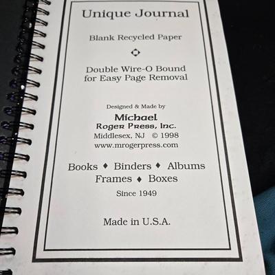 Sale Photo Thumbnail #504: This lot is for Spiral Bound New Journals. This is a pair of Spiral Bound Journals with unlined pages.  One has a Frogs and Kisses holographic cover and the other is a black background with sparkle dots like the night sky,  Unused.  They are both about 7-