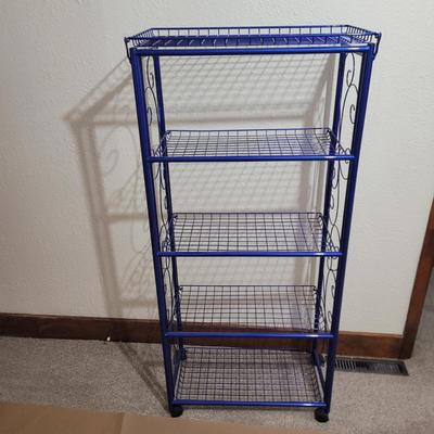 Sale Photo Thumbnail #568: 54" tall, 24" wide and 12" deep.
Store all the items you'll buy at this auction
Top flips backwards so one shelf has a back to it.