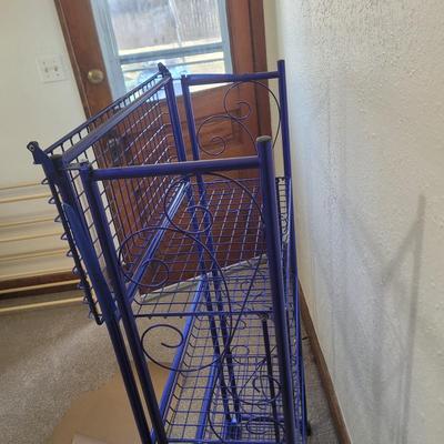 Sale Photo Thumbnail #572: 54" tall, 24" wide and 12" deep.
Store all the items you'll buy at this auction
Top flips backwards so one shelf has a back to it.