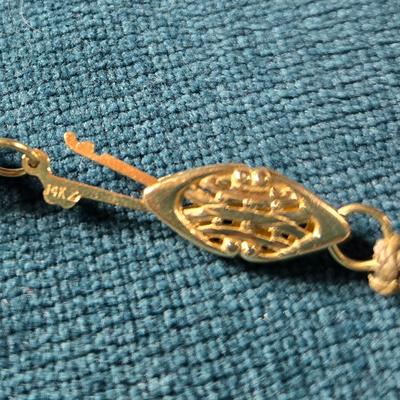 Sale Photo Thumbnail #533: This lot is for a Show Stopper Amethyst Necklace w/14K Gold Clasp. This is a stunning Amethyst Necklace.  The Beads are individually hand knotted in between and the main drop is hand carved.  The beads vary sequentially from large to small to the 14K Gold