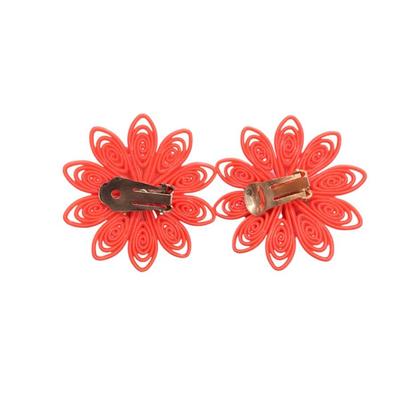 Sale Photo Thumbnail #519: Pair Of Vintage Orange Plastic Clip On Flower Earrings with a Faux Pearl Center