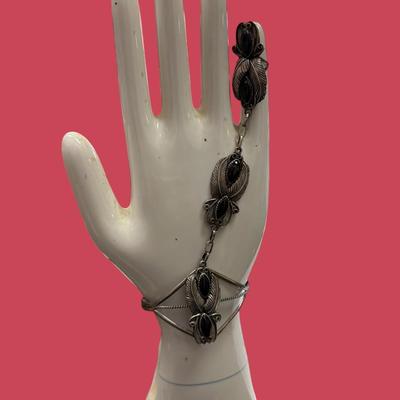 Sale Photo Thumbnail #529: Sterling Silver And Black Onyx Navajo Slave Bracelet   Total weight 300 grams