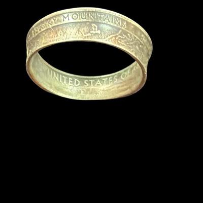 Sale Photo Thumbnail #546: Ring Made from a US Quarter Choice #2  Does not test as silver