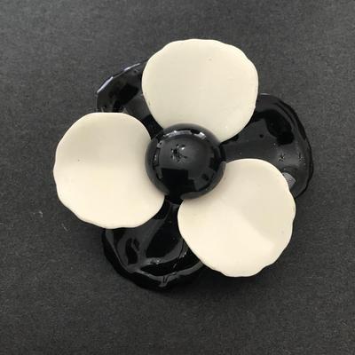 Vintage, black and white enamel flower brooch