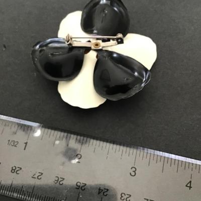 Vintage, black and white enamel flower brooch
