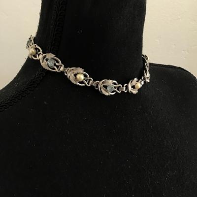Beautiful, vintage believe it may be a Coro , silver toned, Ab light, blue, crystal rhinestone choker necklace