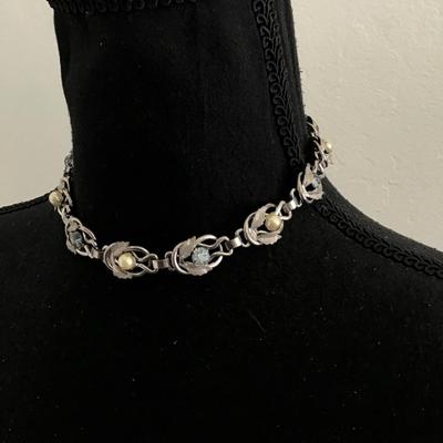 Beautiful, vintage believe it may be a Coro , silver toned, Ab light, blue, crystal rhinestone choker necklace