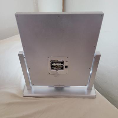 Sale Photo Thumbnail #621: Mirror mirror on the counter. Works, takes 4 AA batteries. Has differing hues for the bulbs, natural, soft and daylight.