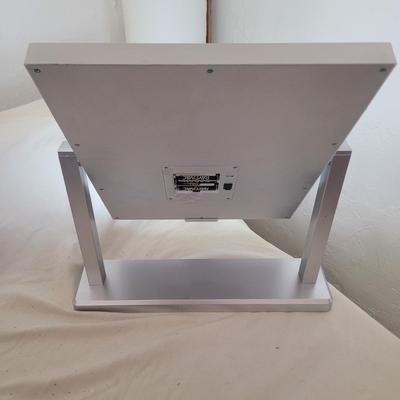 Sale Photo Thumbnail #620: Mirror mirror on the counter. Works, takes 4 AA batteries. Has differing hues for the bulbs, natural, soft and daylight.