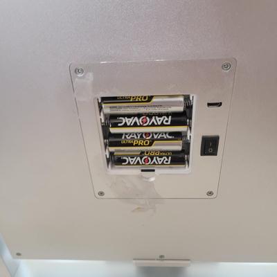 Sale Photo Thumbnail #622: Mirror mirror on the counter. Works, takes 4 AA batteries. Has differing hues for the bulbs, natural, soft and daylight.