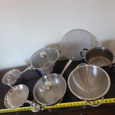 Sale Photo Thumbnail #627: All looks to be Wolfgang Puck except the colander and the other strainer and the pot without a lid. See last pic, 3 of these look to be unused