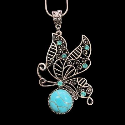 Sale Photo Thumbnail #562: Vintage Silver Toned Butterfly Pendant Necklace With Faux Turquoise Accents