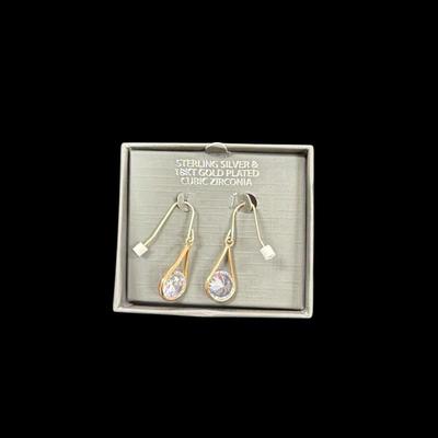 Sale Photo Thumbnail #587: Pair of Sterling Silver and 18 kt gold plated cubic zirconia drop earrings.