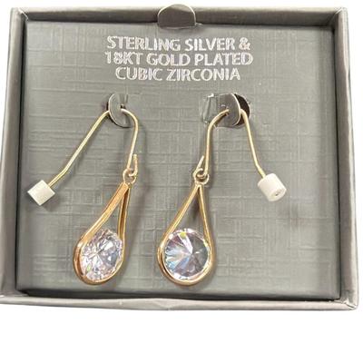 Sale Photo Thumbnail #586: Pair of Sterling Silver and 18 kt gold plated cubic zirconia drop earrings.