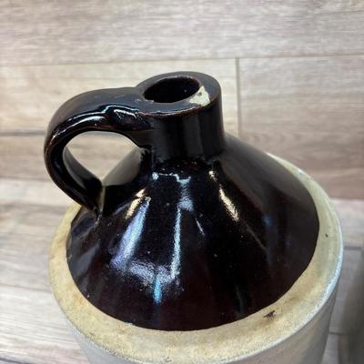 Sale Photo Thumbnail #520: No apparent cracks. Small slice or imperfection on top of jug. See pictures