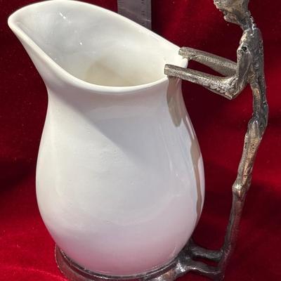 Too cool ceramic pitcher with skeletal figure attached!