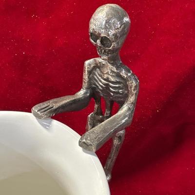 Too cool ceramic pitcher with skeletal figure attached!