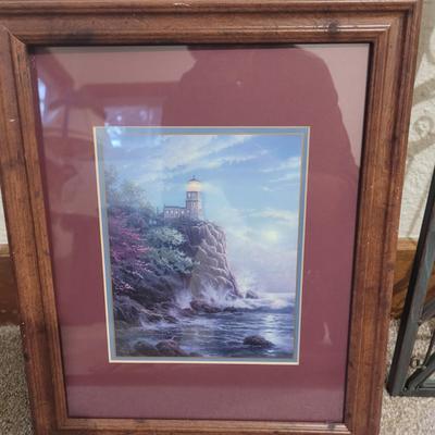 Sale Photo Thumbnail #692: Tge rounded top iron wall decoration is a candle holder