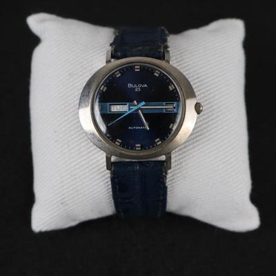 Bulova 23 Men's Automatic SS Oval Watch 11AOACB Blue Dial Day Date