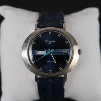 Bulova 23 Men's Automatic SS Oval Watch 11AOACB Blue Dial Day Date