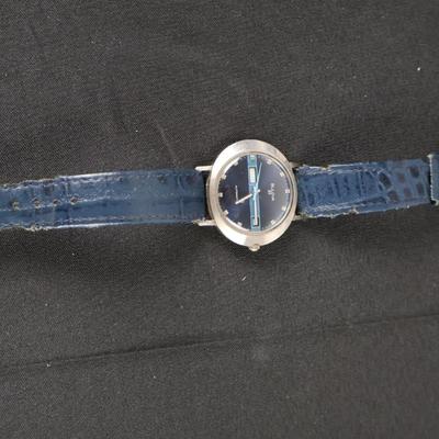 Bulova 23 Men's Automatic SS Oval Watch 11AOACB Blue Dial Day Date