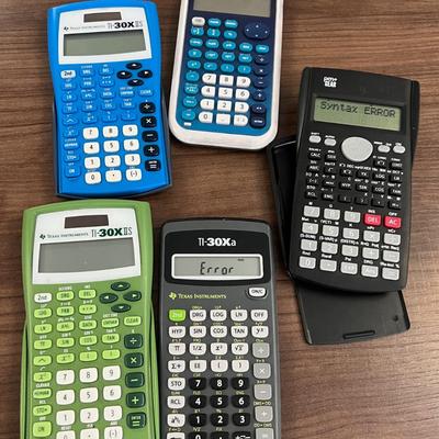 5 Texas Instrument Calculators  - Conference Room